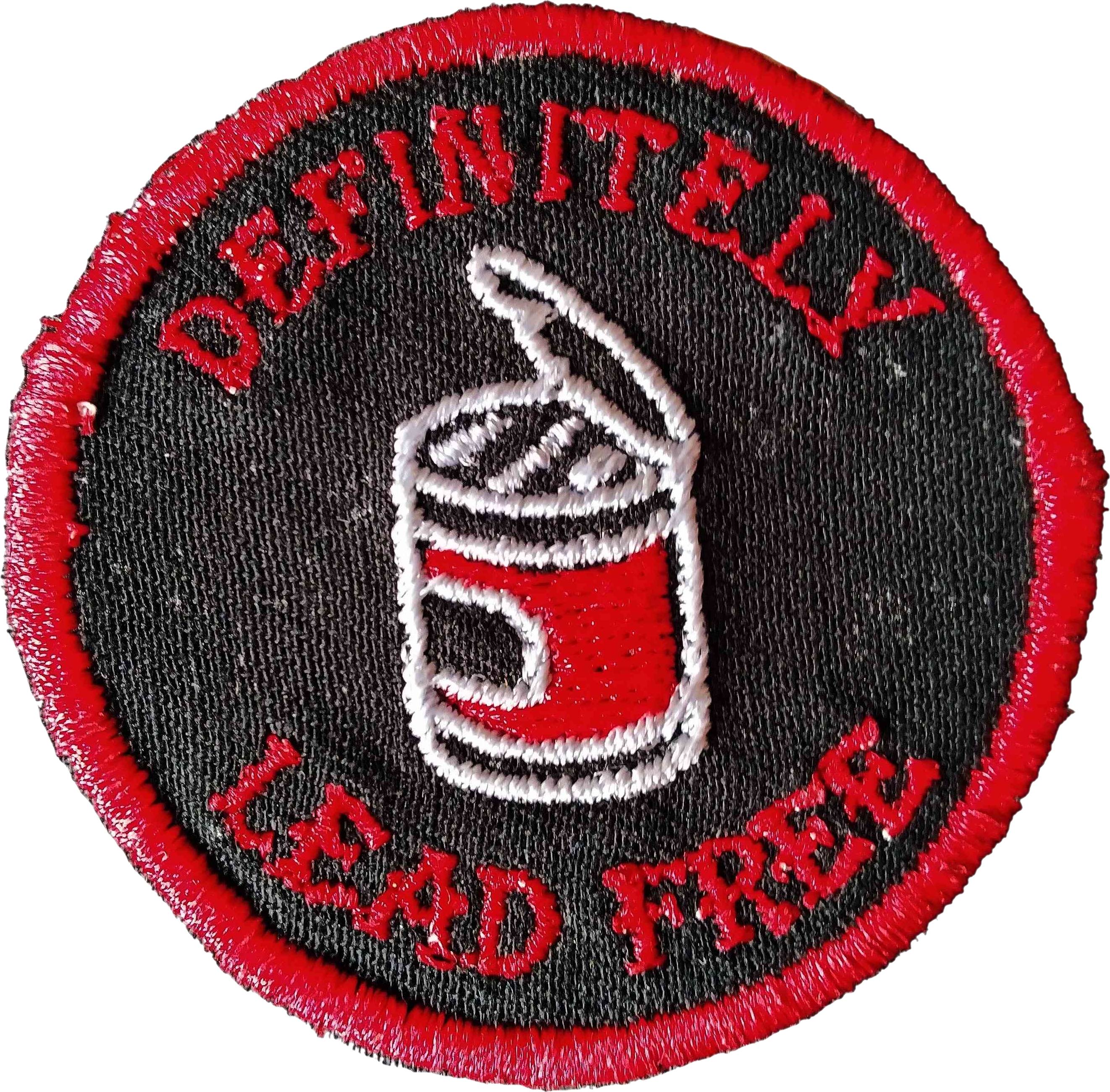 A black, white and read patch of an opened tin and the words 'Definitely Lead Free'
