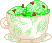 A teacup filled with mint chocolate chip ice cream